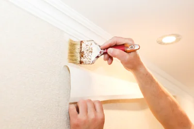 Pose de papier peint à Steige — revêtements muraux et toiles de verre